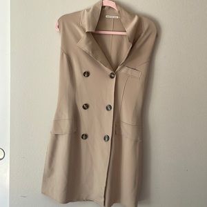 Tan buttoned up sleeveless jacket